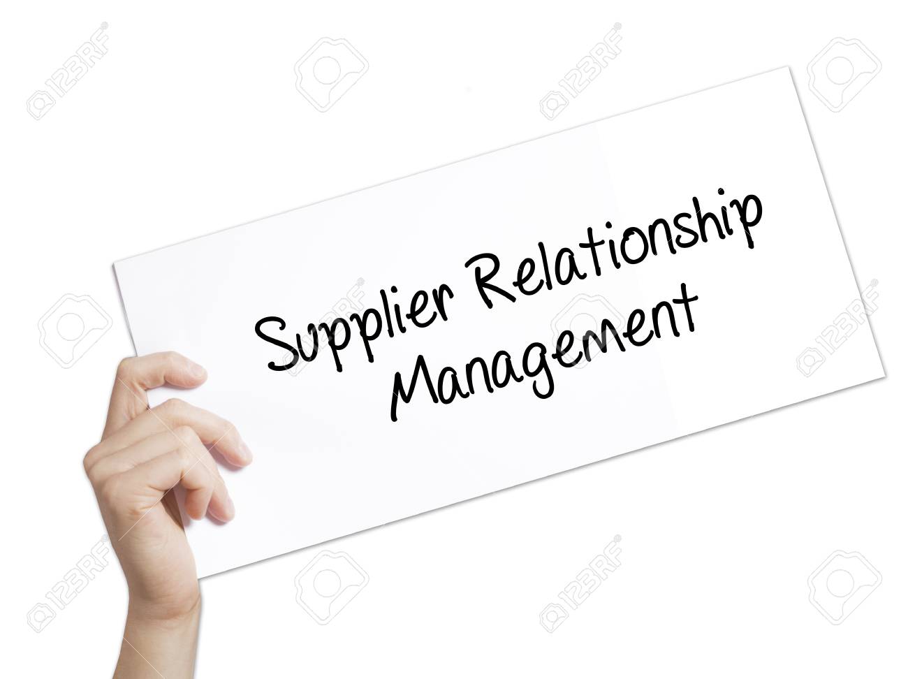 Supplier Relationship Management Sign on white paper. Man Hand H
